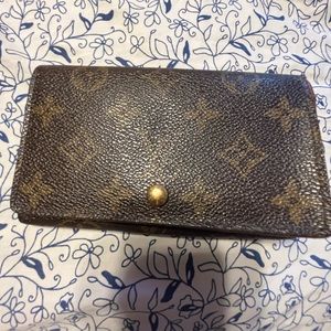 LV monogram porte monnaie tressor bifold wallet